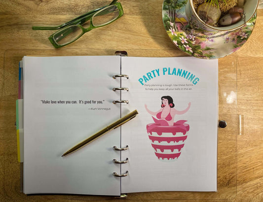 Open planner page with party planning graphic and quote about love, perfect for organizing BDSM lifestyle information.