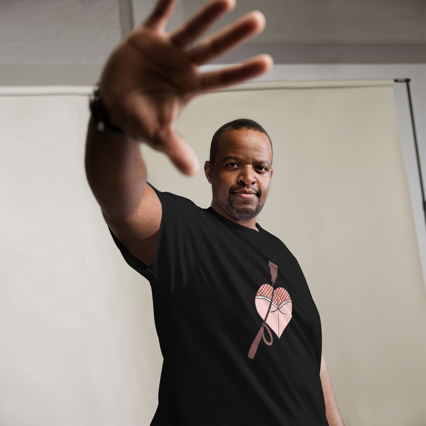 Heart Shaped Butt T-Shirt design on a black background.