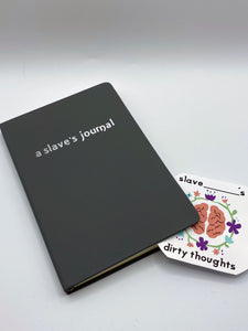 This journal is perfect for thoughtful slaves who want to keep track of their sexual adventures and personal growth. Journal contains 192 blank ruled pages. Comes with a pocket for storage on the inside back cover, a satin bookmark to hold your place, and elastic to keep the book closed when you aren't using it.